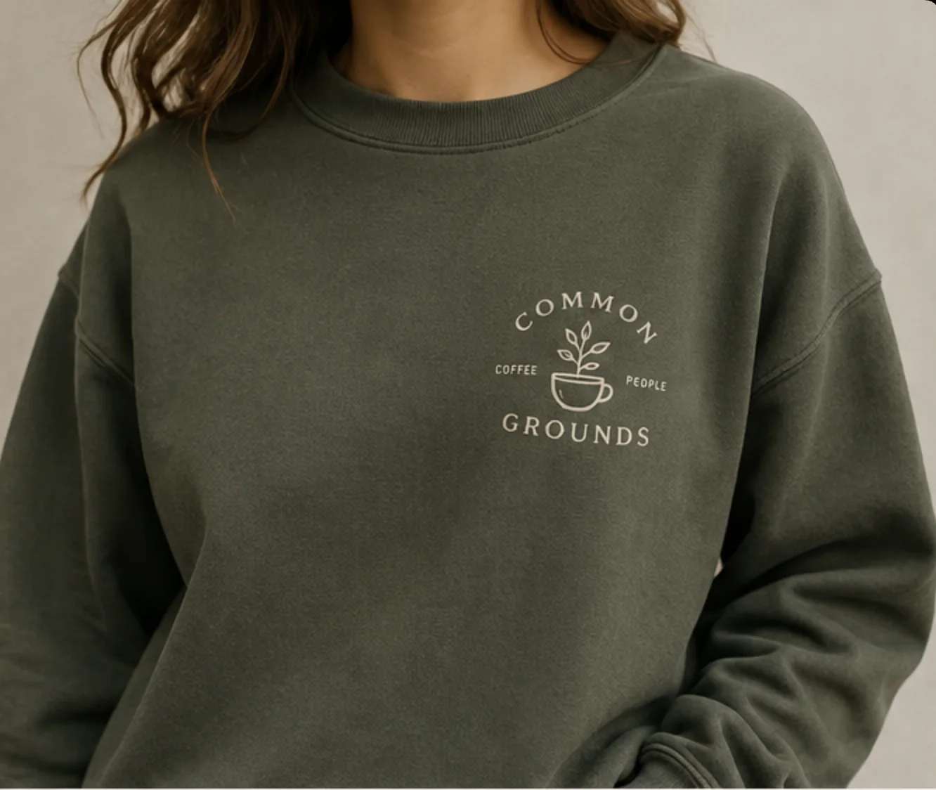Olive Common Grounds sweatshirt with the cup and sprout logo